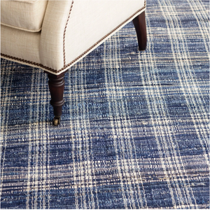 An AnS denim plaid handwoven cotton rug in 2x3 feet with a casual, woven design featuring blue and white denim-inspired patterns.