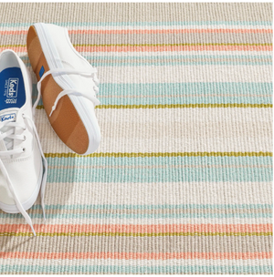 Handwoven cotton rug by AnS with blue and white Daphne Stripe Sky design, measuring 2x3 feet.