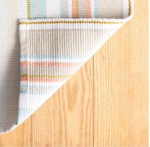 Handwoven Daphne Stripe Sky cotton rug by AnS, featuring blue and white stripes in a 2x3 rug size.