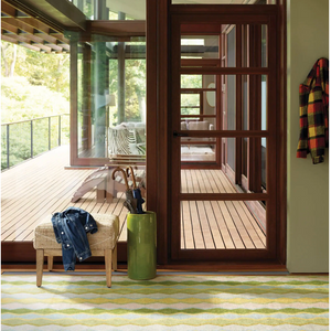 Green washable safety net rug by AnS, Dash and Albert, with a 2x3 foot machine washable design for safety and comfort.