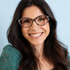 Peepers Sloane blue light eyeglasses with clear lenses and stylish black frames, designed to reduce screen glare.