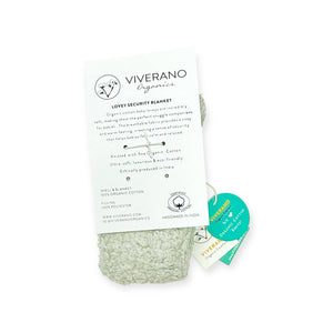 Cream knit baby blanket with a Viverano Organics label and turquoise tag attached.