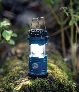 Rechargeable DM Merchandising light lantern and fan 2-in-1 device, portable with handle, for outdoor use and camping.