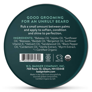Badger organic beard balm for facial hair styling, featuring natural ingredients in a small tin container.