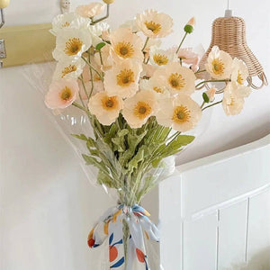 Colorful 22-inch silk poppy spray with flocked floral stem, featuring vibrant, realistic silk flowers and green foliage.