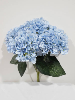 Artificial silk hydrangea flower with soft, full blooms in a natural arrangement, perfect for home decor by Sweet Home Deco.
