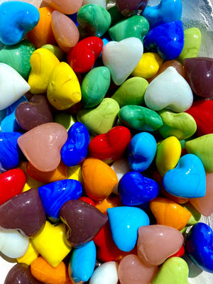 Decorative glass pocket hearts in three color schemes, vibrant and transparent, by SHOPGIVECOURAGE for home decor or gift accents.