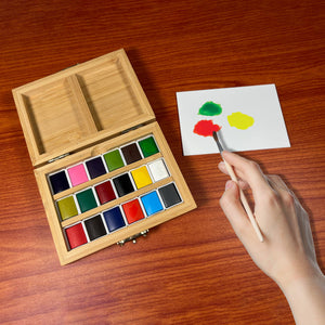 Watercolor set in bamboo box with 18 colors from elseware unplug eco-kids, featuring vibrant paints for creative art projects.