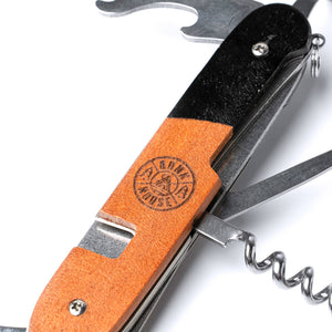 DM Merchandising Bunkhouse Pocket Picnic Camp Utensil with fold-out design and multiple tools, ideal for outdoor cooking and camping.