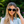 Peepers Frenchy sunglasses with clear eyeglass readers, stylish round frames, and tinted lenses for a trendy look.