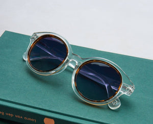 Peepers sunglasses with charm, stylish eyewear featuring a trendy design and decorative accents, ideal for casual wear.