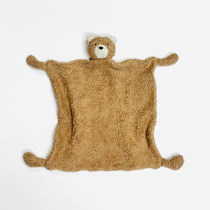 Brown teddy bear blanket with a plush head and limbs on a white background.