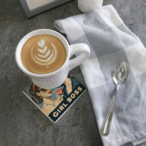 Girl Boss coaster from Tipsy Coasters & Gifts featuring a stylish design with empowering text on a round cork surface.