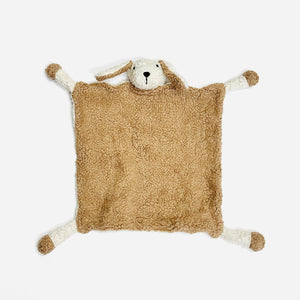 Brown plush dog-shaped blanket with white accents and floppy ears on a white background.