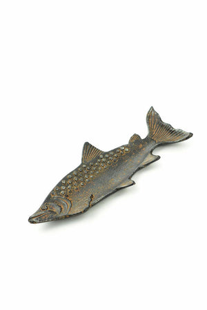 Decorative cast iron fish-shaped dish from Vagabond Vintage, featuring intricate details and a rustic finish.