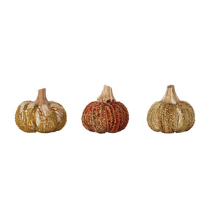 Decorative pumpkin figurines from CCOI, featuring autumn-inspired statues and sculptures for seasonal home decor.