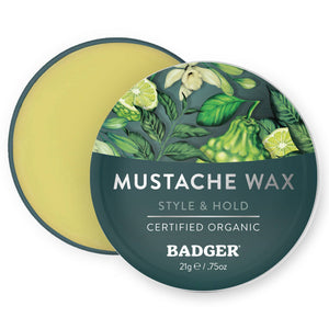 Badger Mustache Wax in a container, medium hold, used for grooming and shaping mustaches with natural ingredients.