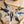 Bird-themed paper garland, 24-inch botanical wall art by Doro Marcello, featuring colorful bird and leaf paper decorations.