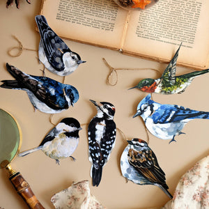 Bird-themed paper garland, 24-inch botanical wall art by Doro Marcello, featuring colorful bird and leaf paper decorations.