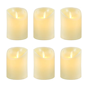 Set of 6 LumaBase battery-operated LED votive candles, showing warm glow and compact design on a neutral surface.