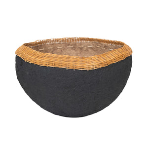 Decorative handmade paper mache bowl with wicker rim, featuring intricate design, ideal for home decor or display.