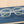 Peepers To the Max reading eyeglasses with clear frames and round lenses, close-up shot showing stylish eyewear.