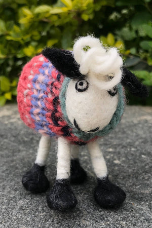 Hand-felted wool sheep decoration from DECOR-Tank Top Tracey by Pachamama Ltd, showcasing a cute, plush sheep for home decor.