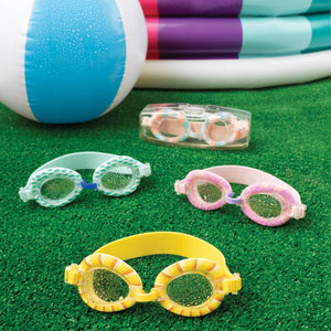 Kids swimming goggles by DM Merchandising with adjustable straps and clear lenses, designed for comfortable pool swimming.