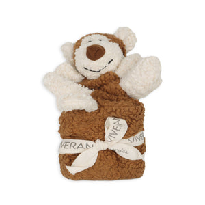 Brown and white fluffy teddy bear with a bow tie, smiling face, and raised paws.