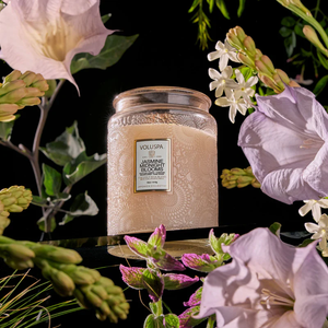Voluspa Jasmine Midnight Blooms large jar candle with 18oz size, featuring a decorative floral design and elegant packaging.