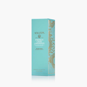 StephanYoung Voluspa French Cade Lavender room spray bottle with lavender and woodgrain design label.