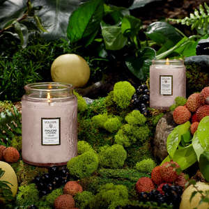 Voluspa Panjore Lychee large 18oz candle jar with a decorative design, showcasing the luxurious candle inside.
