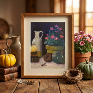 Framed painting of pumpkins, flowers, and jugs. Surroundings include books, a nest, and pink daisies.