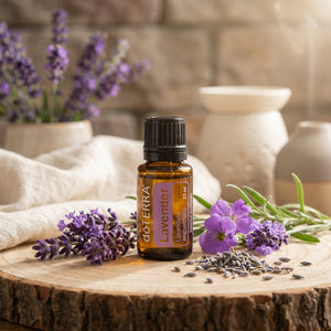 Lavender essential oil bottle on a wooden slab with fresh lavender flowers and soft background lighting.