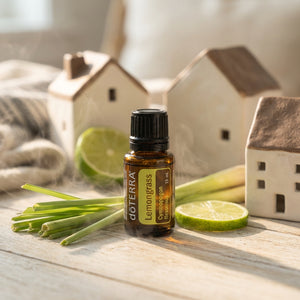 Pleasant Beach Living Lemongrass essential oil bottle from DOTERRA, with vibrant green label and clear glass container.