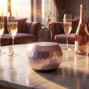Mini wireless speaker in lilac from Pleasant Beach Living, compact design with a sleek, modern appearance.