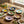 Flower-shaped appetizer dinner plate by CCOI, flower design with decorative edges, perfect for serving small appetizers or snacks.