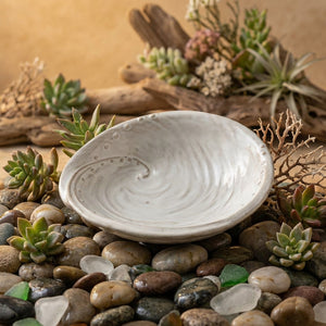 Stoneware Shell Bowl by CCOI, elegant coastal decor piece with a textured shell design on a neutral background.