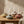 Terracotta candle holder with wax relief dots for tealight or taper candles, by CCOI, showcasing a rustic, textured design.