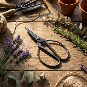 HomArt forged iron utility scissors with sharp blades and ergonomic handles, designed for versatile cutting tasks.