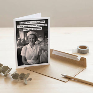 Black and white card with nurse photo, humorous text, brown envelope, eucalyptus, pen, and tape.