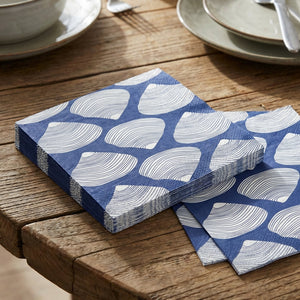 Set of paper cocktail napkins in a clamshell design by Boston International, featuring elegant patterns for dining or parties.