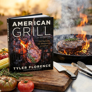 Cookbook titled "American Grill" with steak, tomatoes, and corn; grill flames in the background.