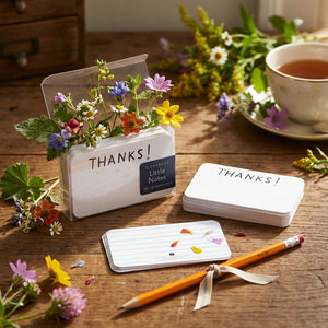 E. Frances Paper thank you note cards featuring small, elegant notes for expressing gratitude in a stylish, minimal design.
