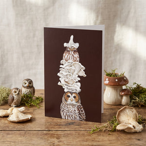 HnC Shroom With a View greeting card featuring colorful mushroom illustrations on a scenic background.