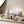 White ceramic aromatherapy essential oil diffuser by Cliganic, showcasing its sleek design and mist outlet for relaxing scents.