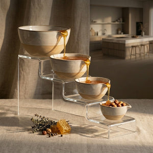 Set of four CCOI stoneware batter bowls with glazed interior and exterior, ideal for mixing and baking.
